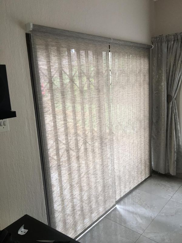 Vertical blinds across a sliding patio door