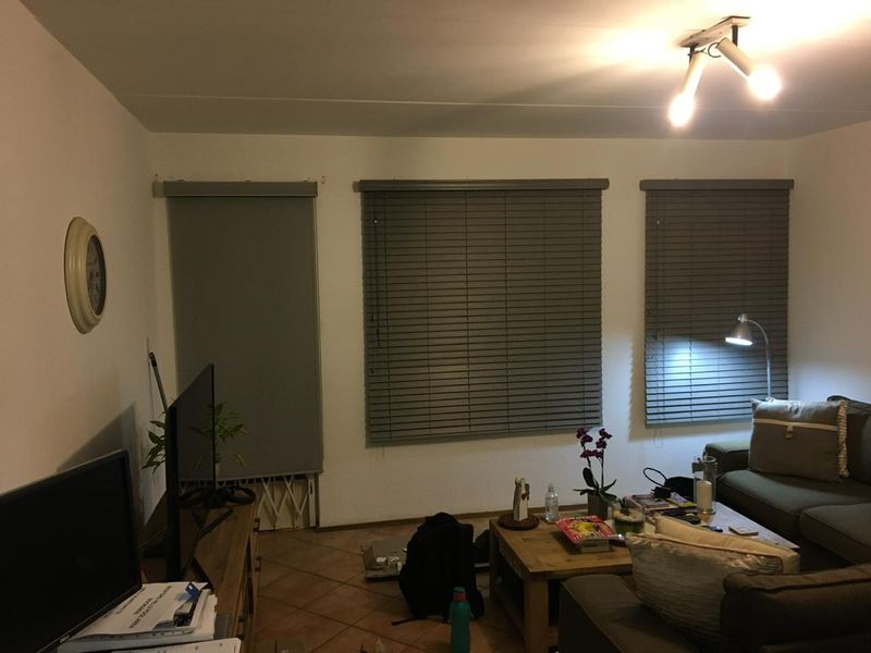 Venetian blinds across a lounge