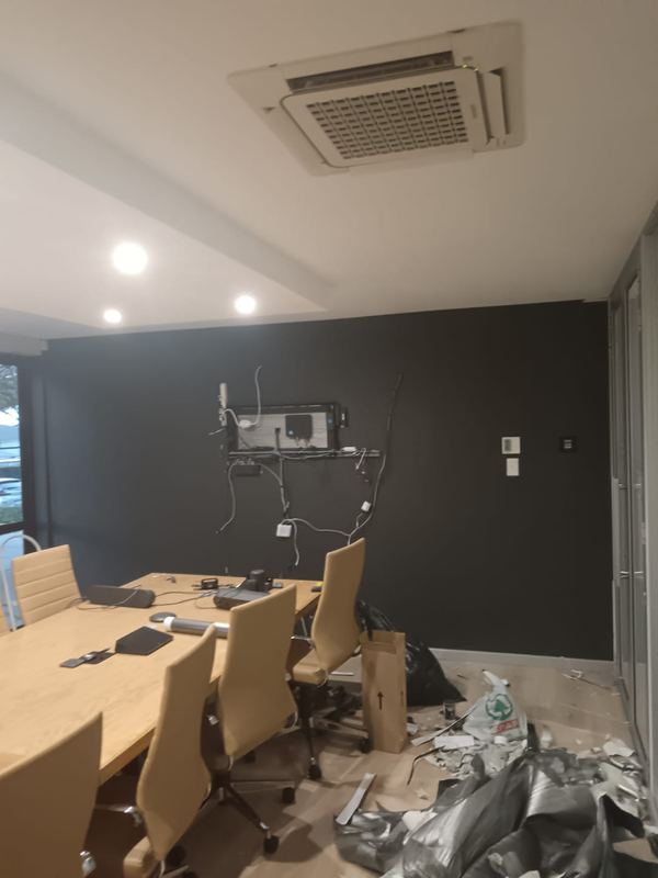 Feature wall painted with ceilings and trims cut in