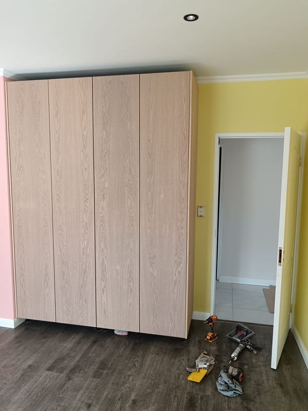 Built-in wardrobe hung and levelled