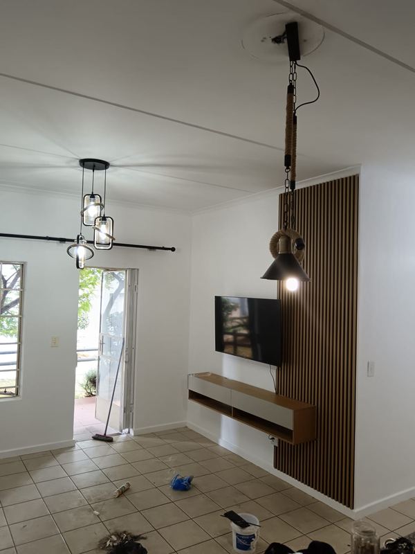 Slatted TV wall and floating console